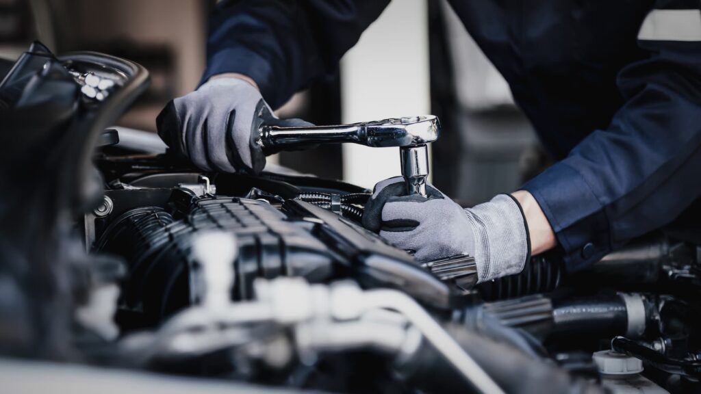 Mechanic Working On Engine 1 1024x576